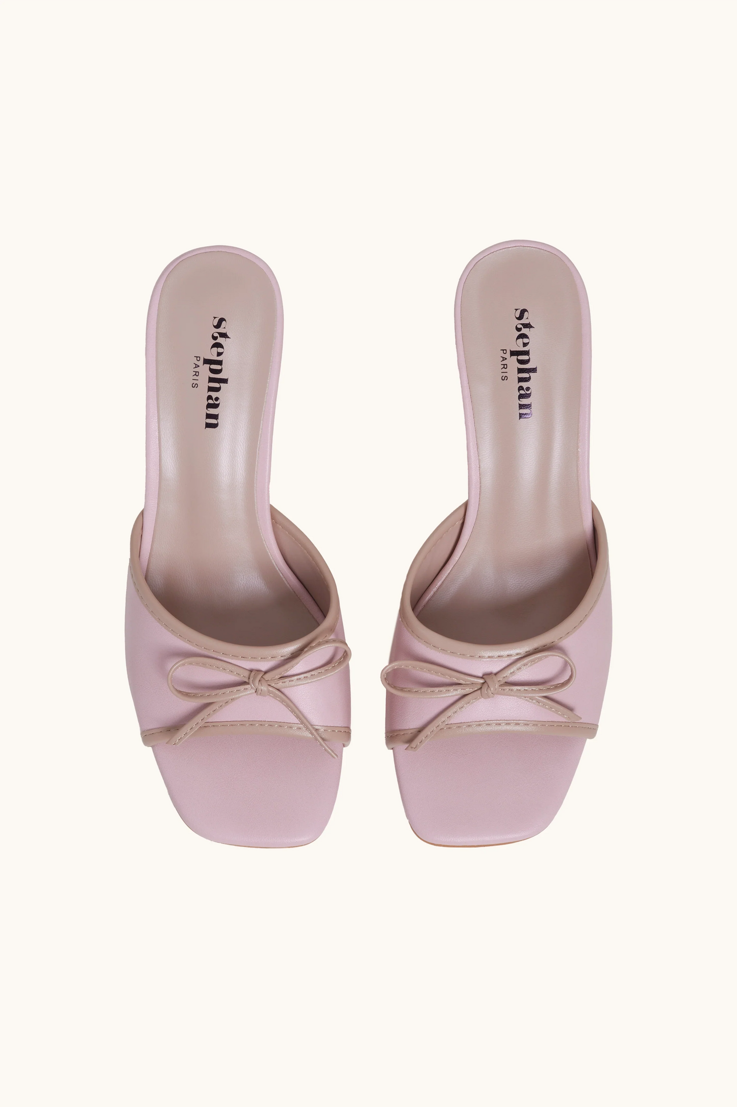 Mules bicolore à détail nœud rose
