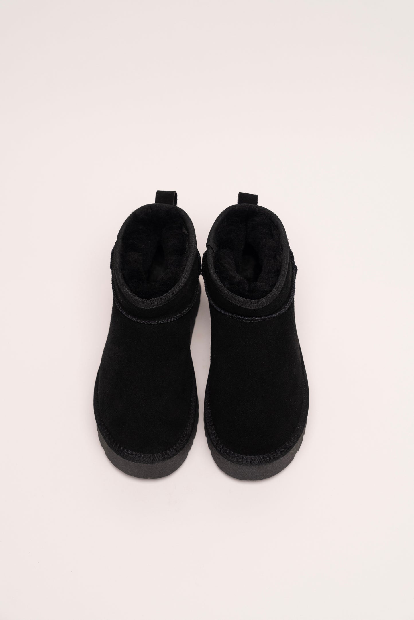 Leather platform boots and black wool filled