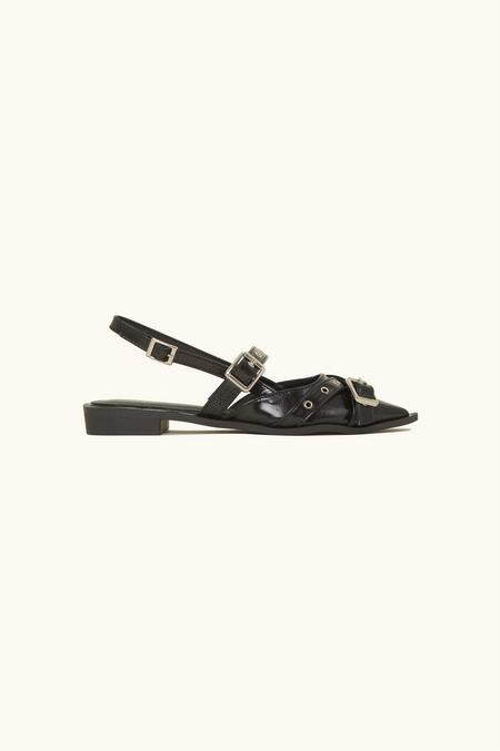 Black ballerinas with multiple flanges and eyelets