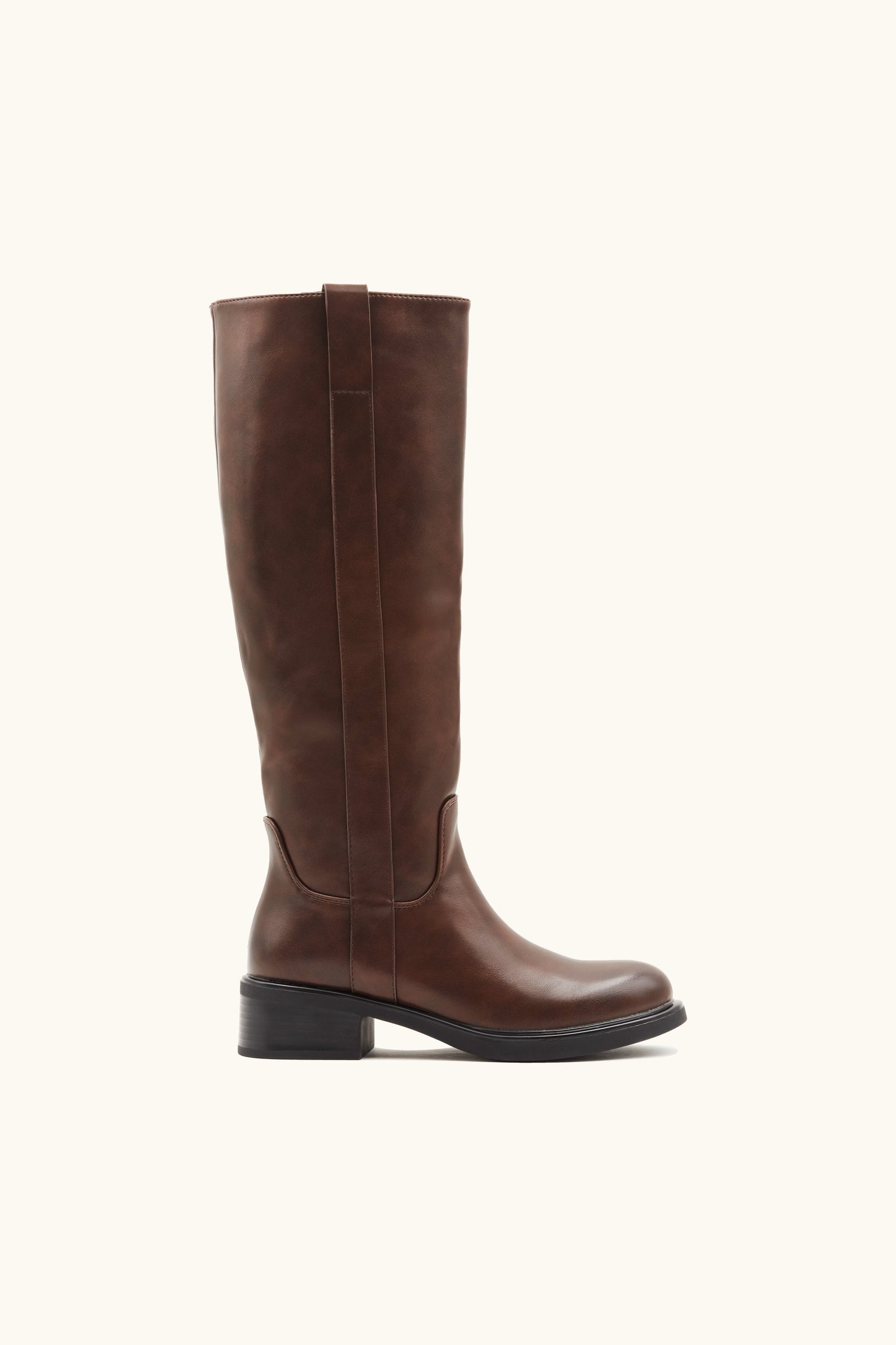 Brown tubular boots