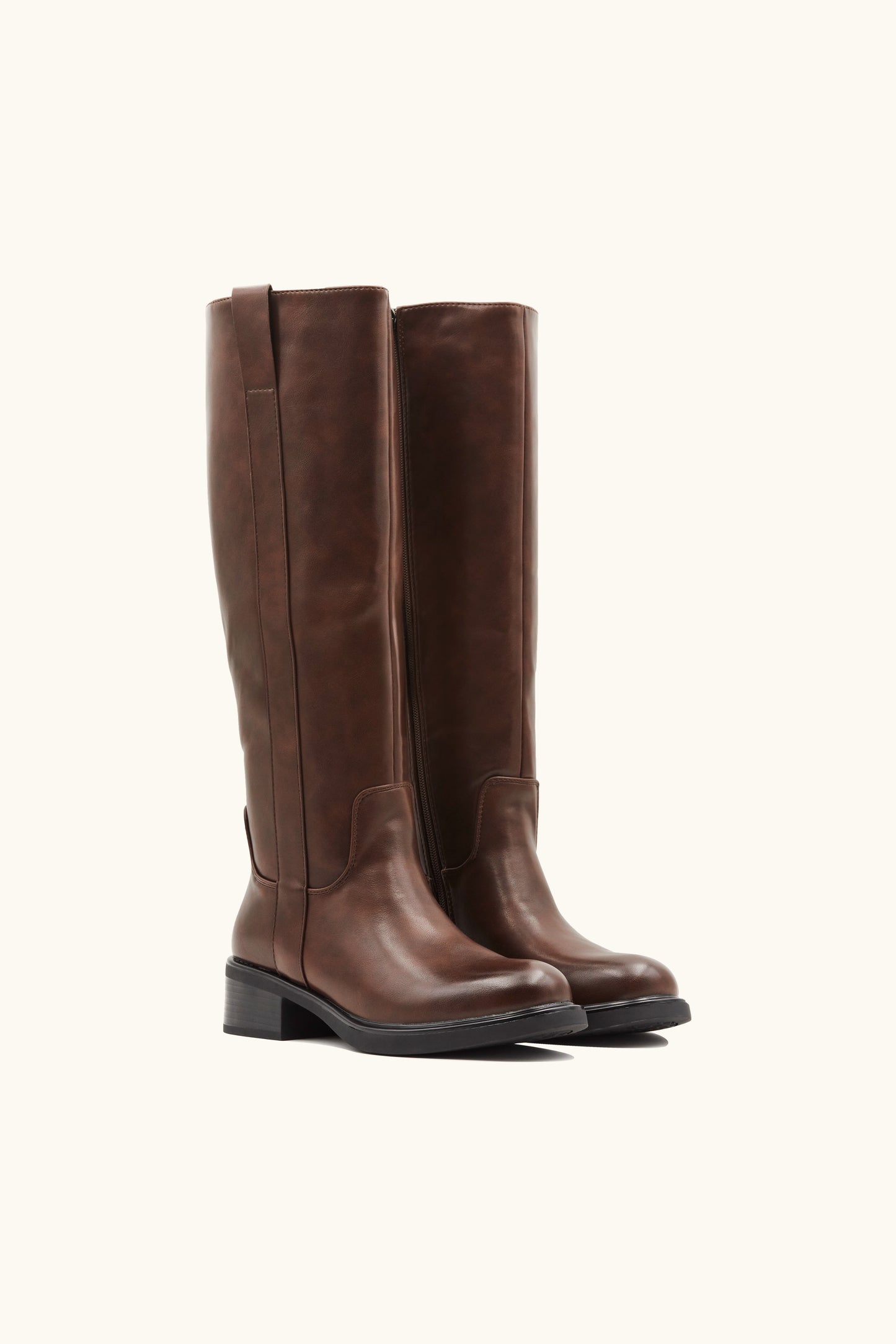 Brown tubular boots